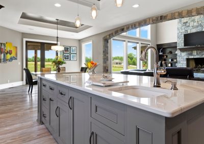 kitchen with white countertops and gray cabinets